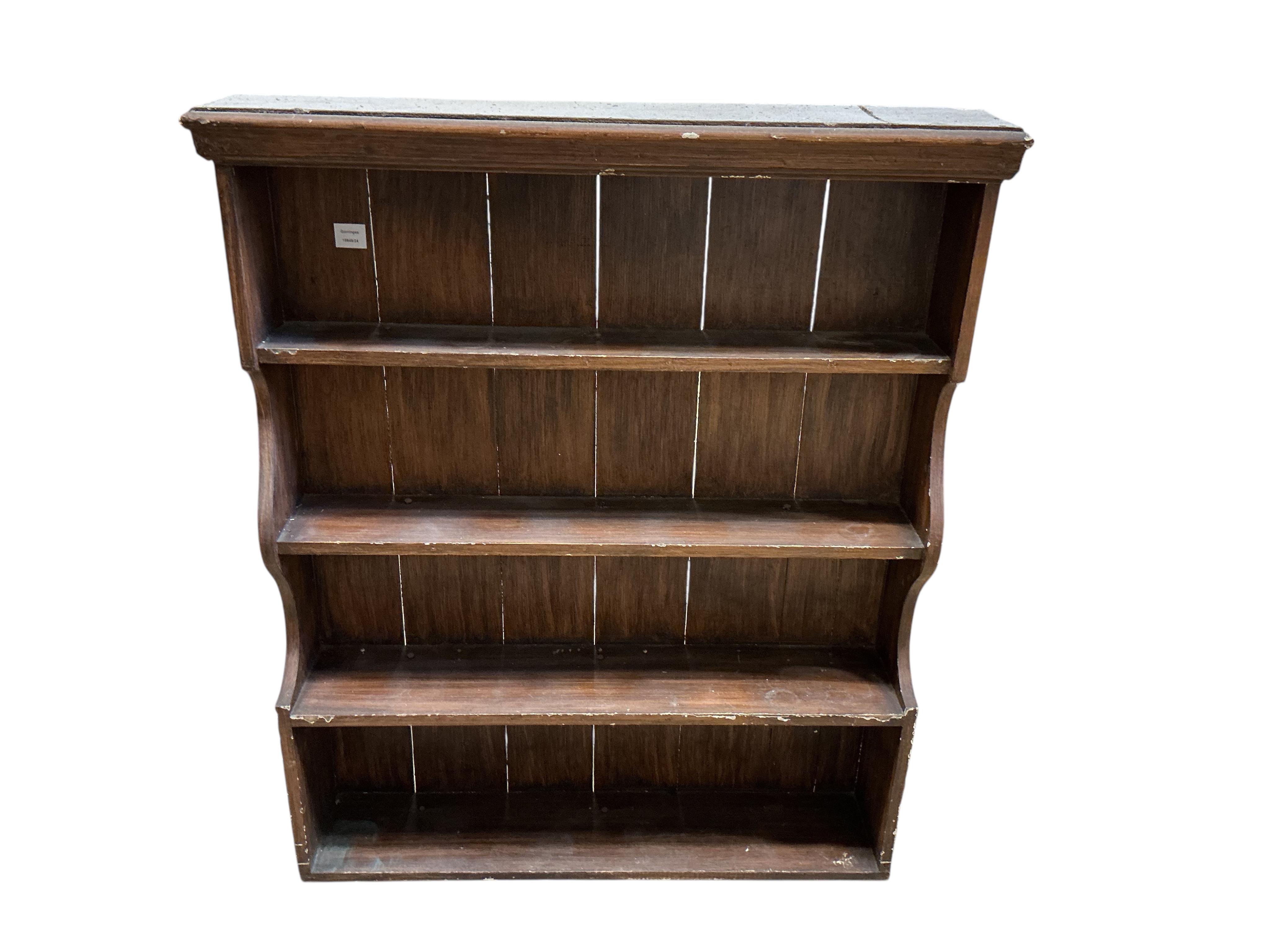 A 19th century plate rack, with painted simulated grain, width 96cm, depth 19cm, height 113cm